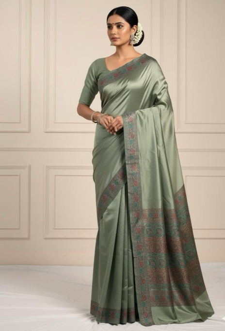 Elegant Light Green Soft Silk Saree with Delicate Border
